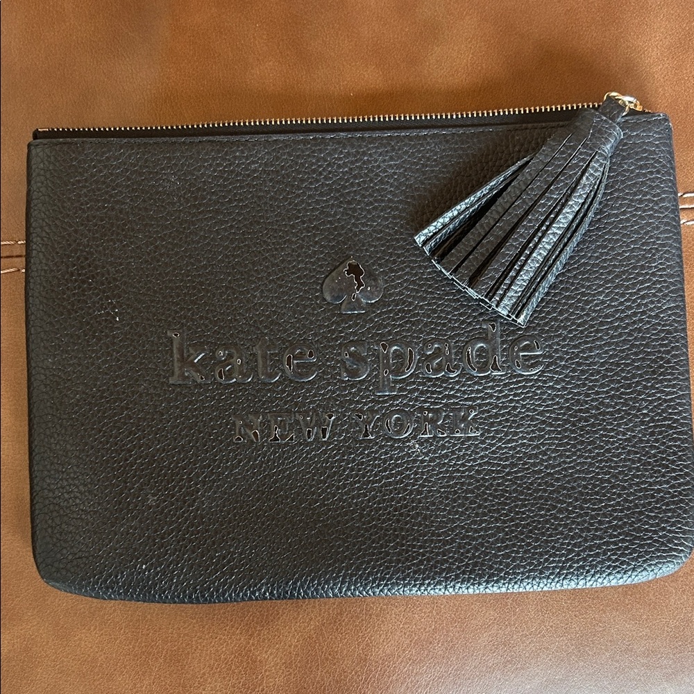 kate spade black pebbled leather tassel pouch